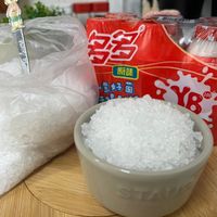 可能是粥和顯示的文字是「 มง 名多 原味 意好菌 E3 好」的圖像