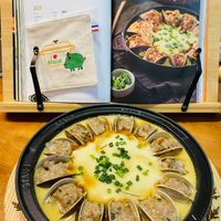 可能是火鍋、豆腐和文字的圖像