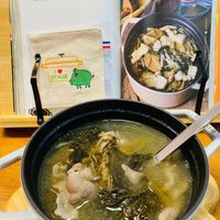 可能是火鍋、豆腐、粥和文字的圖像