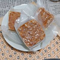 可能是拉麵、豆腐、火鍋和文字的圖像