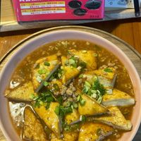可能是拉麵、豆腐、粥和文字的圖像