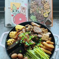 可能是豆腐、拉麵、火鍋和文字的圖像