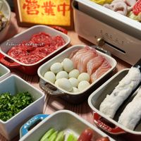 可能是起司火鍋、豆腐、火鍋和文字的圖像