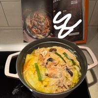 可能是火鍋、豆腐、拉麵和文字的圖像