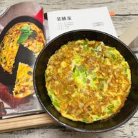 可能是豆腐、歐姆蛋和文字的圖像