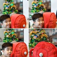 可能是玩具、手提箱和文字的圖像