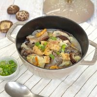 可能是豆腐、粥和香菇的圖像