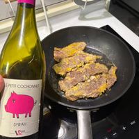 可能是顯示的文字是「 LE PETIT COCHONNET SYRAH Vp0o MAX + 」的圖像