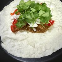 可能是墨西哥捲餅和希臘旋轉烤肉的圖像