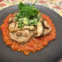可能是豆腐、香菇和燉小牛膝的圖像