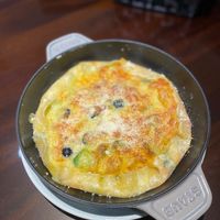 可能是牧羊人派、肉餡餅、歐姆蛋和文字的圖像