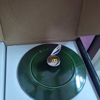 可能是唱片機、鬆餅機和文字的圖像