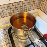 可能是茶、泡茶器和文字的圖像