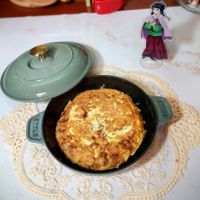 可能是舒芙蕾、牧羊人派、肉餡餅和文字的圖像
