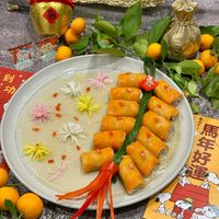 可能是甜點、龍眼和顯示的文字是「到 功 -+00 ซิน 年 好 ي አውጠወው- 如 ወጠ C Ang EaлEraЛR FAng 」 的圖像