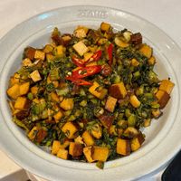 可能是豆煮玉米和豆腐的圖像