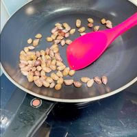 可能是木湯匙和焗豆的圖像