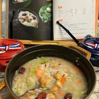 可能是火鍋、粥和文字的圖像