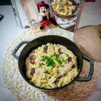 可能是印度香料飯、炒飯、北非小米飯和西班牙大鍋飯的圖像