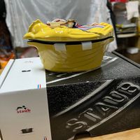 可能是鬆餅機和顯示的文字是「 حر staub staub stau 」 的圖像