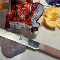 可能是食物和刀的圖像