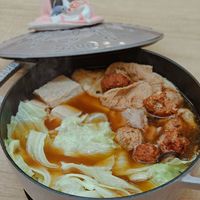 可能是火鍋、豆腐和文字的圖像