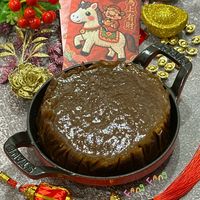 可能是蛋糕和顯示的文字是「定 有 財 FAngFAn9 ၈ LAN9 LAng ትጋራ 」的圖像