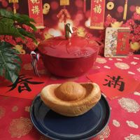 可能是舒芙蕾、肉餡餅和文字的圖像