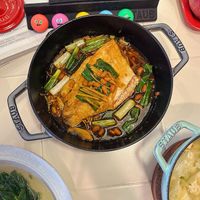 可能是豆腐、火鍋和文字的圖像
