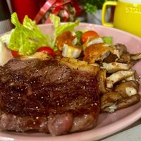 可能是肉排和文字的圖像