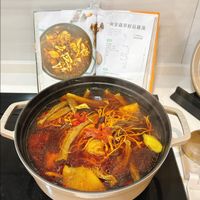 可能是豆腐、火鍋、麵和文字的圖像