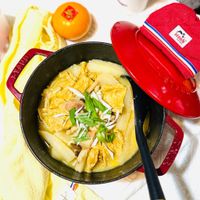 可能是粥、火鍋、豆腐和文字的圖像