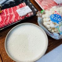 可能是火鍋、豆腐、粥和文字的圖像