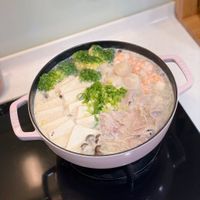可能是火鍋、豆腐和文字的圖像