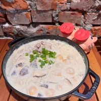 可能是豆腐、燉小牛膝、粥和文字的圖像