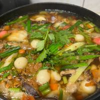 可能是拉麵、粥和香菇的圖像