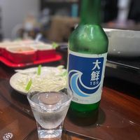 可能是‎飲料和‎顯示的文字是「‎大 本 አሥማ 鮮 1 159 BR 과당 תנה 관당0% 0%‎ 」‎‎ 的圖像