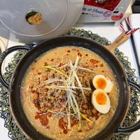 可能是粥、拉麵、水波蛋和文字的圖像