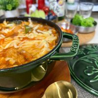 可能是火鍋、豆腐和文字的圖像