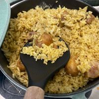 可能是西班牙大鍋飯、印度香料飯和炒飯的圖像