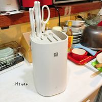 可能是泡茶器、熱水器和文字的圖像