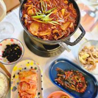 可能是火鍋、豆腐和文字的圖像