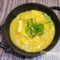 可能是拉麵、豆腐、粥和文字的圖像