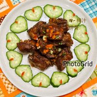 可能是食物和顯示的文字是「が OOOC + 0代製 4- 4-梅汁 肉 PhotoGrid ZEISS 民享里高雄市 民享里 高雄市 2026/04/0617:38 17:38 」的圖像