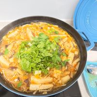 可能是火鍋、豆腐和文字的圖像