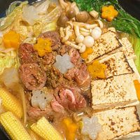 可能是火鍋、豆腐和文字的圖像