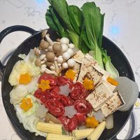 可能是火鍋、豆腐和文字的圖像