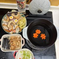 可能是火鍋、起司火鍋和顯示的文字是「 SUGAR 1 STAUS STAUB AES ISTAUE Rinnai 」的圖像