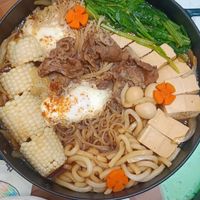 可能是水波蛋、拉麵、火鍋、豆腐和文字的圖像