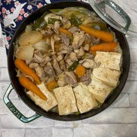 可能是火鍋、豆腐和文字的圖像